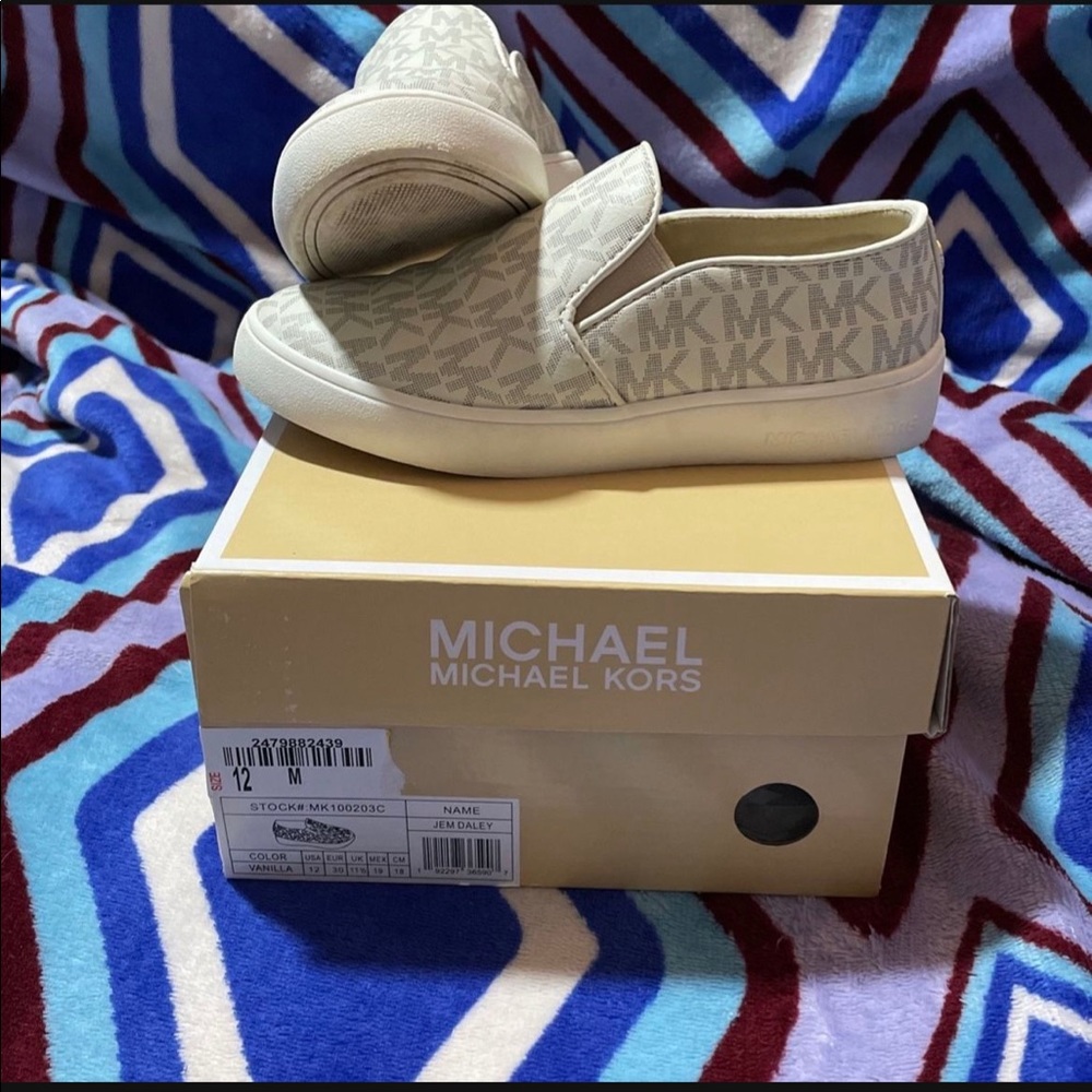 Girl Michael Kors shoes.